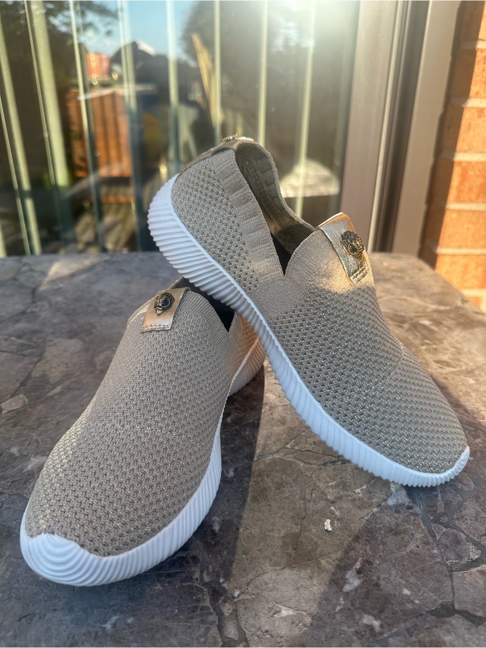 Kurt Geiger Taupe Slip-On Knit Sneakers with White Sole and Gold Badge